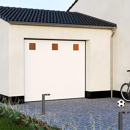 Porte de garage sectionnelle avec Hublots